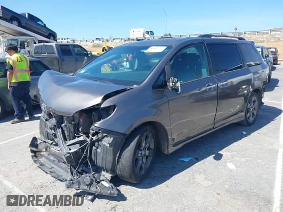 2016 Toyota Sienna SE with VIN 5TDXK3DC4GS708290, listed as a IAAI auction lot 41851812 with 136,544 mi miles and . Bid and sale history available at DreamBid. Image 2.