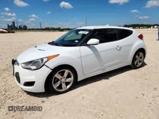 2014 Hyundai Veloster z VIN KMHTC6ADXEU211730, wystawiony jako Copart lot #71236595 z przebiegiem 107 121 mil mil oraz Szkoda całkowita • Salvage title. Historia ofert i sprzedaży dostępna na DreamBid. Obrazek 1.