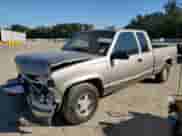 1999 Chevrolet Silverado 1500 with VIN 1GCEC19M4XR137733, listed as a Copart auction lot 73574694 with 400,007 mi miles and Salvage title. Bid and sale history available at DreamBid. Image 1.
