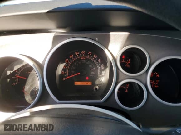 2012 Toyota Tundra z VIN 5TFRM5F13CX040352, wystawiony jako Copart lot #82679795 z przebiegiem 131 423 mil mil oraz Szkoda całkowita • Salvage title. Historia ofert i sprzedaży dostępna na DreamBid. Obrazek 9.