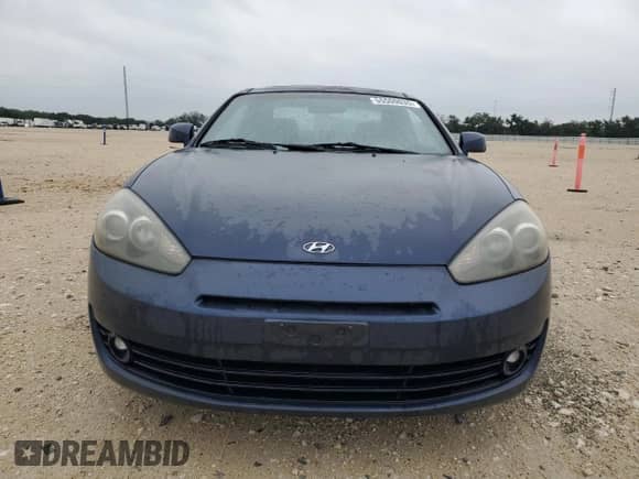 2008 Hyundai Tiburon GS с VIN KMHHM66D28U284008, выставлен на аукционе Copart как лот 55500035 с пробегом 108 084 миль миль и Списание • Salvage title. История ставок и продаж доступна на DreamBid. Изображение 5.