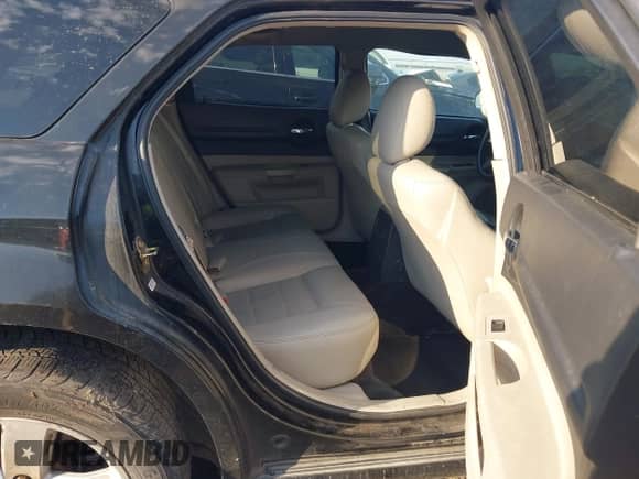 2005 Dodge Magnum SXT with VIN 2D4GZ48VX5H638063, listed as a IAAI auction lot 42755527 with 203,621 mi miles and . Bid and sale history available at DreamBid. Image 8.