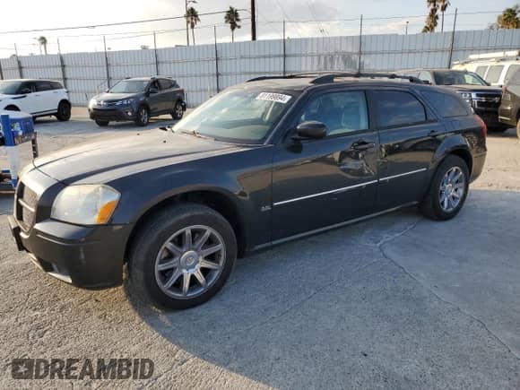2005 Dodge Magnum SXT with VIN 2D8GZ48V95H648551, listed as a Copart auction lot 81199894 with 210,231 mi miles and Salvage title. Bid and sale history available at DreamBid. Image 1.