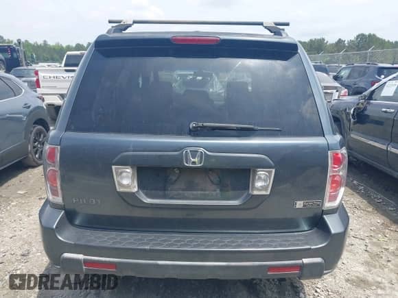 2006 Honda Pilot EX-L z VIN 5FNYF285X6B037032, wystawiony jako IAAI lot #42232591 z przebiegiem 205 551 mil mil oraz . Historia ofert i sprzedaży dostępna na DreamBid. Obrazek 16.