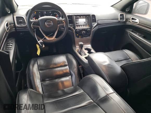 2016 Jeep Grand Cherokee High Altitude with VIN 1C4RJECG4GC314575, listed as a Copart auction lot 84265744 with 129,144 mi miles and Salvage title. Bid and sale history available at DreamBid. Image 8.