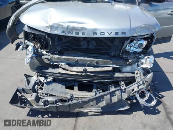2013 Land Rover Range Rover Sport HSE Lux z VIN SALSK2D45DA763202, wystawiony jako IAAI lot #42885709 z przebiegiem 142 474 mil mil oraz . Historia ofert i sprzedaży dostępna na DreamBid. Obrazek 6.