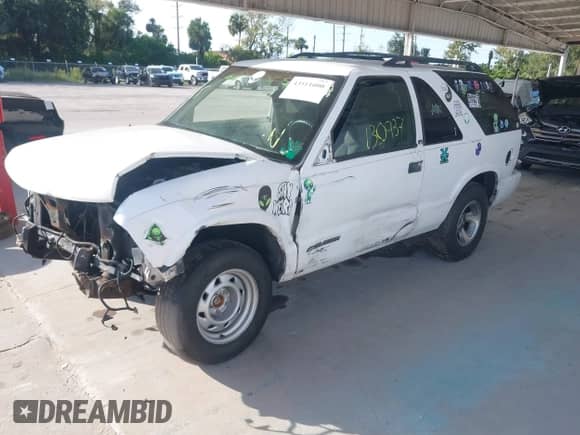 2003 Chevrolet Blazer Xtreme with VIN 1GNCS18X63K137572, listed as a IAAI auction lot 43511000 with 130,937 mi miles and . Bid and sale history available at DreamBid. Image 2.