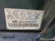 1997 Honda Civic z VIN JHMEJ8544VS002051, wystawiony jako Copart lot #58399195 z przebiegiem 239 283 mil mil oraz Szkoda całkowita • Salvage title. Historia ofert i sprzedaży dostępna na DreamBid. Obrazek 12.