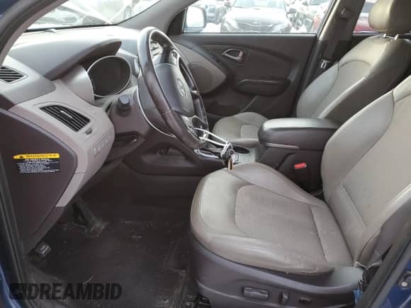 2015 Hyundai Tucson SE z VIN KM8JUCAG8FU008981, wystawiony jako Copart lot #41673225 z przebiegiem 65 401 mil mil oraz Szkoda całkowita • Salvage title. Historia ofert i sprzedaży dostępna na DreamBid. Obrazek 7.