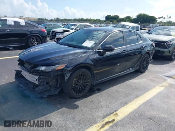 2023 Toyota Camry SE z VIN 4T1G11AK6PU774219, wystawiony jako IAAI lot #42733636 z przebiegiem 43 027 mil mil oraz . Historia ofert i sprzedaży dostępna na DreamBid. Obrazek 18.