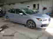 2020 Subaru Impreza Premium with VIN 4S3GTAD68L3724760, listed as a Copart auction lot 68588015 with 60,797 mi miles and Salvage title. Bid and sale history available at DreamBid. Image 4.