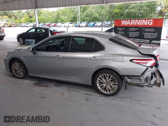 2020 Toyota Camry Hybrid XLE z VIN 4T1F31AK1LU533605, wystawiony jako IAAI lot #42790450 z przebiegiem 98 102 mil mil oraz . Historia ofert i sprzedaży dostępna na DreamBid. Obrazek 15.