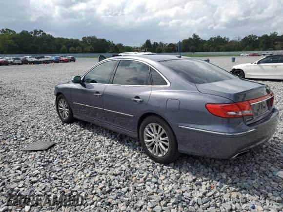 2011 Hyundai Azera Limited z VIN KMHFC4DFXBA525745, wystawiony jako Copart lot #63046015 z przebiegiem 97 627 mil mil oraz Szkoda całkowita • Salvage title. Historia ofert i sprzedaży dostępna na DreamBid. Obrazek 2.