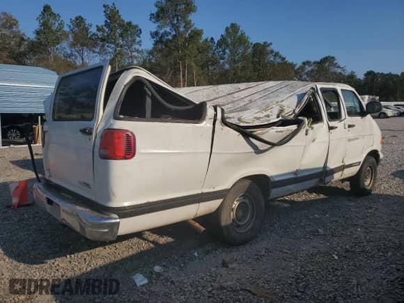 2002 Dodge Passenger with VIN 2B5WB35Z32K131768, listed as a Copart auction lot 74399064 with 161,341 mi miles and Salvage title. Bid and sale history available at DreamBid. Image 3.