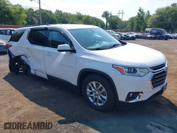 2019 Chevrolet Traverse LT Cloth z VIN 1GNEVGKW2KJ269249, wystawiony jako IAAI lot #42836941 z przebiegiem 74 886 mil mil oraz . Historia ofert i sprzedaży dostępna na DreamBid. Obrazek 17.