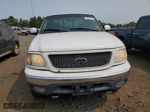 2000 Ford F-150 XL with VIN 1FTRX18W3YNA83990, listed as a Copart auction lot 59264145 with Not provided miles and Salvage title. Bid and sale history available at DreamBid. Image 5.