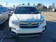 2021 Honda Pilot Touring 7-Passenger with VIN 5FNYF5H64MB031671, listed as a IAAI auction lot 41332415 with 90,411 mi miles and . Bid and sale history available at DreamBid. Image 12.