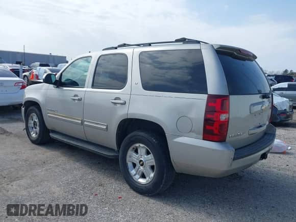 2009 Chevrolet Tahoe 2LT with VIN 1GNEC23379R258434, listed as a IAAI auction lot 41558672 with 133,646 mi miles and . Bid and sale history available at DreamBid. Image 3.