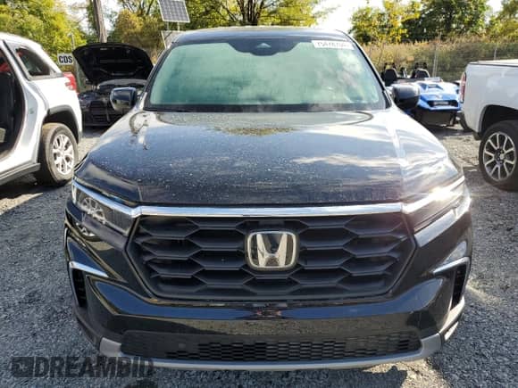 2024 Honda Pilot EX-L with VIN 5FNYG1H51RB019899, listed as a Copart auction lot 75478704 with 7,397 mi miles and Salvage title. Bid and sale history available at DreamBid. Image 5.