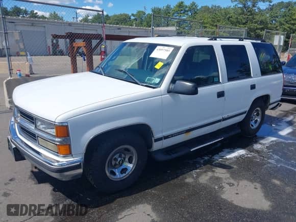 1999 Chevrolet Tahoe Police Special z VIN 1GNEC13R2XR103155, wystawiony jako IAAI lot #43097585 z przebiegiem 125 723 mil mil oraz . Historia ofert i sprzedaży dostępna na DreamBid. Obrazek 2.