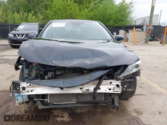 2021 Toyota Camry Hybrid XLE with VIN 4T1F31AK8MU563752, listed as a IAAI auction lot 42134620 with 19,484 mi miles and . Bid and sale history available at DreamBid. Image 13.