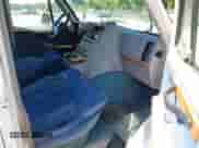 1993 Chevrolet Chevy Van z VIN 1GBEG25K5PF330218, wystawiony jako IAAI lot #42321737 z przebiegiem 203 157 mil mil oraz . Historia ofert i sprzedaży dostępna na DreamBid. Obrazek 5.