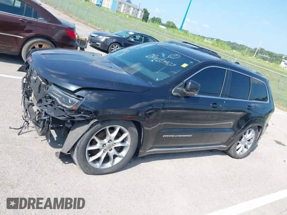 2015 Jeep Grand Cherokee Summit с VIN 1C4RJFJM4FC764997, выставлен на аукционе IAAI как лот 42966100 с пробегом Не указан миль и . История ставок и продаж доступна на DreamBid. Изображение 13.