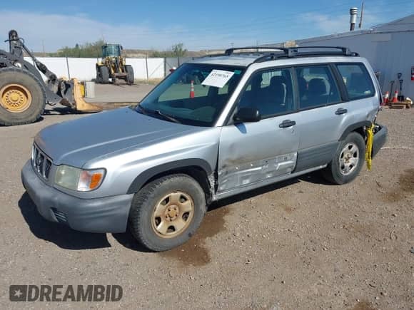 2002 Subaru Forester L with VIN JF1SF63542H716167, listed as a IAAI auction lot 42190765 with 156,775 mi miles and . Bid and sale history available at DreamBid. Image 2.