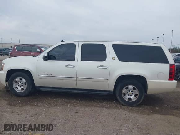 2010 Chevrolet Suburban LTZ с VIN 1GNUCKE03AR248244, выставлен на аукционе IAAI как лот 41677238 с пробегом 184 698 миль миль и . История ставок и продаж доступна на DreamBid. Изображение 14.