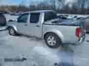 2010 Nissan Frontier Pro-4X with VIN 1N6AD0EV8AC414587, listed as a Copart auction lot 87806035 with 81,378 mi miles and Salvage title. Bid and sale history available at DreamBid. Image 2.