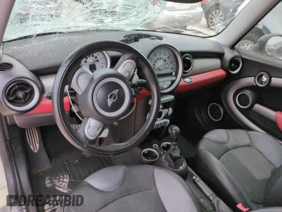 2009 MINI Hardtop S with VIN WMWMF73569TW87347, listed as a Copart auction lot 59445035 with 118,336 mi miles and Salvage title. Bid and sale history available at DreamBid. Image 8.