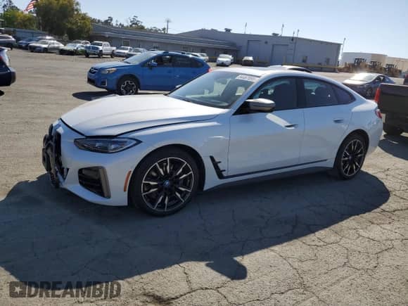 2023 BMW i4 M50 with VIN WBY33AW04PFP87980, listed as a Copart auction lot 84467095 with 6,331 mi miles and Salvage title. Bid and sale history available at DreamBid. Image 1.