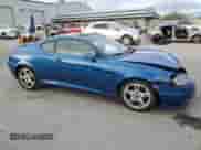 2005 Hyundai Tiburon GT с VIN KMHHN65F45U183144, выставлен на аукционе Copart как лот 87487994 с пробегом 59 582 миль миль и Списание • Salvage title. История ставок и продаж доступна на DreamBid. Изображение 4.