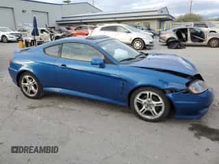 2005 Hyundai Tiburon GT с VIN KMHHN65F45U183144, выставлен на аукционе Copart как лот 87487994 с пробегом 59 582 миль миль и Списание • Salvage title. История ставок и продаж доступна на DreamBid. Изображение 4.