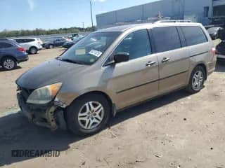 2009 Honda Odyssey LX с VIN 5FNRL38219B033979, выставлен на аукционе Copart как лот 84711075 с пробегом 154 397 миль миль и Списание • Salvage title. История ставок и продаж доступна на DreamBid. Изображение 1.