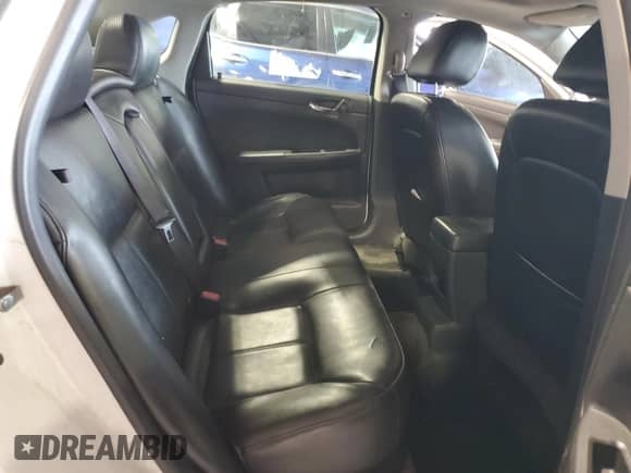 2012 Chevrolet Impala LTZ with VIN 2G1WC5E30C1221083, listed as a Copart auction lot 81643965 with 153,674 mi miles and Salvage title. Bid and sale history available at DreamBid. Image 10.