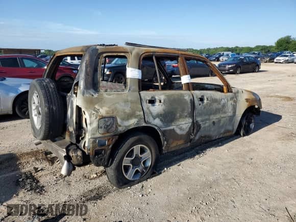 2003 Chevrolet Tracker LT z VIN 2CNBE634236917265, wystawiony jako Copart lot #55777535 z przebiegiem Nie podano mil oraz Nie do naprawy • Non repairable. Historia ofert i sprzedaży dostępna na DreamBid. Obrazek 3.