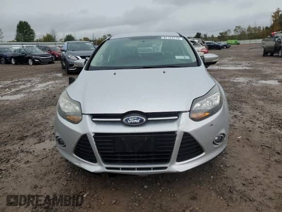 2014 Ford Focus Titanium with VIN 1FADP3J26EL243452, listed as a Copart auction lot 82123775 with 127,009 mi miles and Salvage title. Bid and sale history available at DreamBid. Image 5.