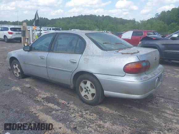 2004 Chevrolet Malibu Classic z VIN 1G1ND52F24M632174, wystawiony jako IAAI lot #42219900 z przebiegiem 250 912 mil mil oraz . Historia ofert i sprzedaży dostępna na DreamBid. Obrazek 3.