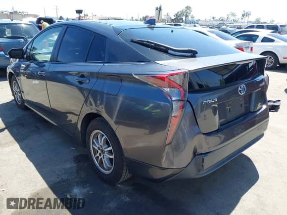 2016 Toyota Prius Two z VIN JTDKBRFU8G3003139, wystawiony jako IAAI lot #42317059 z przebiegiem 125 636 mil mil oraz . Historia ofert i sprzedaży dostępna na DreamBid. Obrazek 3.