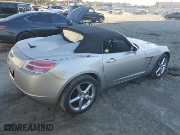 2007 Saturn Sky с VIN 1G8MB35B57Y124617, выставлен на аукционе Copart как лот 76162604 с пробегом 140 003 миль миль и Списание • Salvage title. История ставок и продаж доступна на DreamBid. Изображение 3.