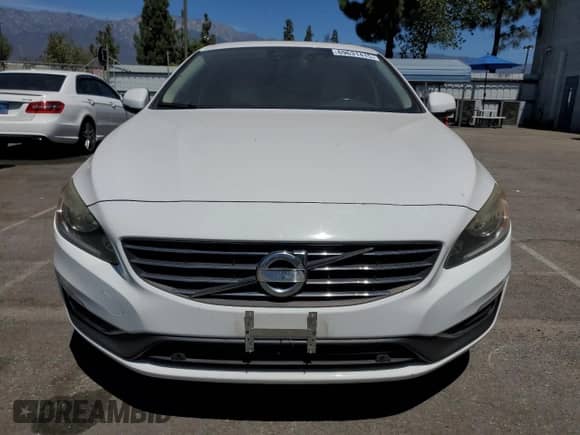 2015 Volvo S60 с VIN YV126MFD2F1309782, выставлен на аукционе Copart как лот 69631415 с пробегом 81 767 миль миль и Списание • Salvage title. История ставок и продаж доступна на DreamBid. Изображение 5.
