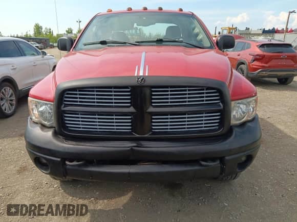 2005 Dodge 3500 SLT with VIN 3D7LS38C85G750908, listed as a Copart auction lot 60713105 with 180,752 mi miles and Salvage title. Bid and sale history available at DreamBid. Image 5.