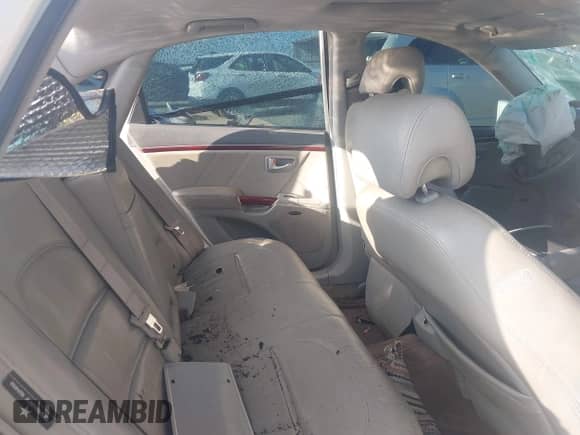 2006 Hyundai Azera SE z VIN KMHFC46FX6A086839, wystawiony jako IAAI lot #42725645 z przebiegiem Nie podano mil oraz . Historia ofert i sprzedaży dostępna na DreamBid. Obrazek 8.