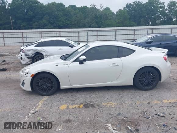 2014 Scion FR-S z VIN JF1ZNAA1XE9705936, wystawiony jako IAAI lot #42641834 z przebiegiem 86 705 mil mil oraz . Historia ofert i sprzedaży dostępna na DreamBid. Obrazek 14.