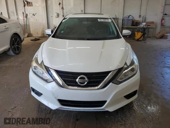2016 Nissan Altima S with VIN 1N4AL3AP9GC244818, listed as a Copart auction lot 85148415 with 74,169 mi miles and Salvage title. Bid and sale history available at DreamBid. Image 5.