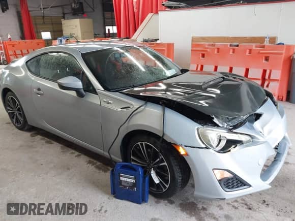 2013 Scion FR-S z VIN JF1ZNAA12D2730675, wystawiony jako IAAI lot #42321319 z przebiegiem 83 074 mil mil oraz . Historia ofert i sprzedaży dostępna na DreamBid. Obrazek 1.