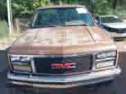 1989 GMC Sierra 1500 z VIN 1GTDC14K5KZ529078, wystawiony jako IAAI lot #43059983 z przebiegiem 158 207 mil mil oraz . Historia ofert i sprzedaży dostępna na DreamBid. Obrazek 12.