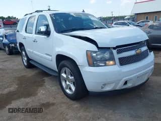 2007 Chevrolet Tahoe LTZ with VIN 1GNFC13027R338743, listed as a IAAI auction lot 43015789 with 168,315 mi miles and . Bid and sale history available at DreamBid. Image 1.