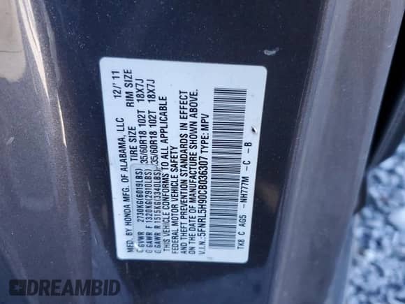 2012 Honda Odyssey Touring с VIN 5FNRL5H90CB036307, выставлен на аукционе Copart как лот 87445705 с пробегом 226 485 миль миль и Списание • Salvage title. История ставок и продаж доступна на DreamBid. Изображение 13.